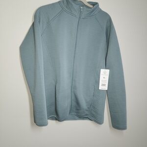 NWT Women Blue lightweight spandex jacket.